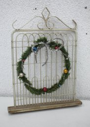 Holiday Wall Hanging Of A Gate With A Wreath