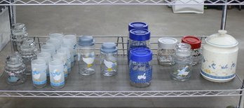 Shelf Lot Of Glasses And Glass Jars In The Theme Of Mostly Blue