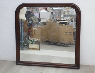 Curved Wooden Mirror With Cherry Finish Frame