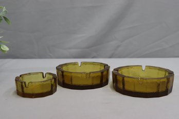 Three Mid-Century Modern Amber Glass Ashtray