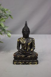 Intricately Patterned Thai Buddha Figurine Sitting In Meditative Pose