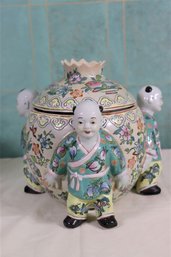 Chinese Porcelain Temple Jar With Figural Feet Trio Of Standing Monks