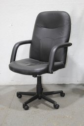 Black Executive Desk Chair On Asterisk Wheeled Base