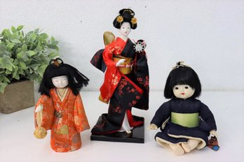 Three Japanese Geisha And Kimono Dolls