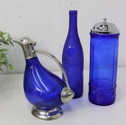 Cobalt Glass Group Lot: Italian Pewter Duck Decanter, Barber-Style Dispenser, Hock Style Bottle
