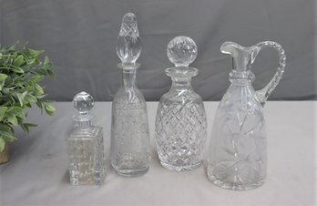 Group Lot Of Cut Crystal Decanters And A Pitcher
