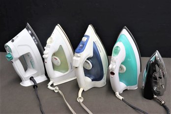 Group Of Irons And One Travel Iron