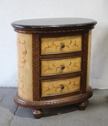 Three Drawer Oval Nightstand With Floral Leaf Motif Decoration
