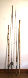 Two Bamboo Vintage Fishing Poles And Two Walking Sticks