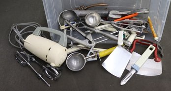 Shelf Lot Of Scoops, Peelers, Presses, And Assorted Kitchen/Prep Utensils