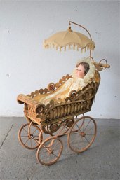 Vintage Baby Doll In Vintage Wicker And Reed Baby Doll Carriage With Parasol Canopy