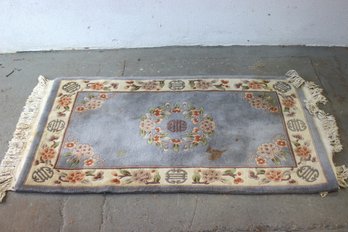 Blue Oriental Rug With Symbols & Flowers  (73' X 42')