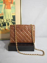 CHANEL Lambskin Quilted Small CC Single Flap Bag In Rich Brown
