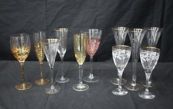Assorted Lot Of Glass Flutes And Wine Glass