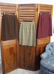 Trio Of Elegant Women's Skirts In Classic Colors And Patterns