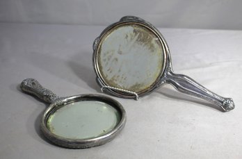 Pair Of Antique Hand Held Vanity Mirrors With Ornate Silver Frames