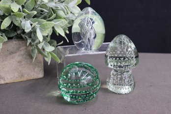 Group Of 3 Murano Style Bullicante Glass Paperwieghts: Clear Mushroom, Green Sphere, And Elongated Inner