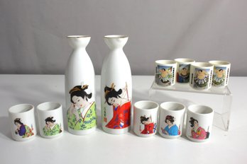 Japanese Sake Set With Geisha And Sumo Wrestler Motifs  11 Pieces