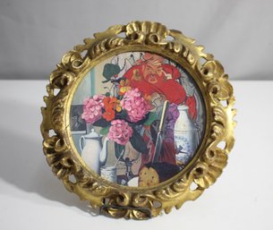 Ornate, Gold-toned, Circular Frame Enigmatic Composition With Flowers