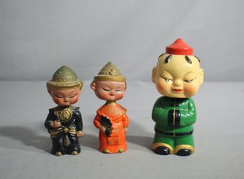 Enigmatic Trio: Vintage Asian-Inspired Figurine And Salt & Pepper Shaker