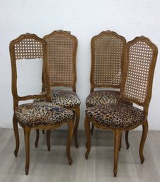 Set Of Four Cane Back And Leopard Print Seat Chairs