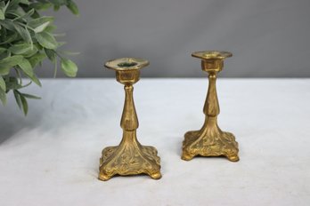 A Pair Of Art Nouveau-style Brass Candlesticks