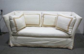 Vintage Sofa With Embroidered Pillows And Skirting