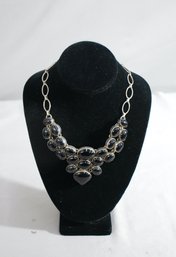 Black Glossy Banded Oval Bead Assemblage On Oval Link Chain Necklace