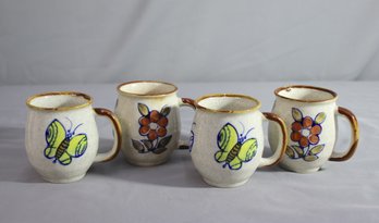 Set Of  Four (4) Vintage Speckled Stoneware Mugs With Orange Flowers And Butterfly