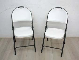 Two Deluxe Folding White Chairs