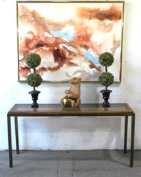 Sleek Modern Console Table With Brass Frame And Glass Top