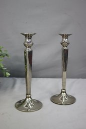 A Pair Of Shiny Silver-tone Metal 12' Candlesticks