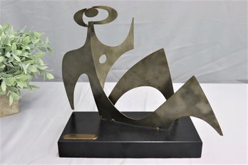 Metal Female Sculpture Title Sever On A Black Wooden Base 2/500