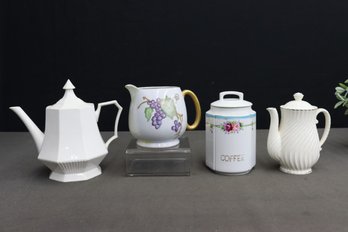 Group Lot Of Ceramic Pitchers And Tea Pots (one Is Plug In Electric) And A Coffee Canister