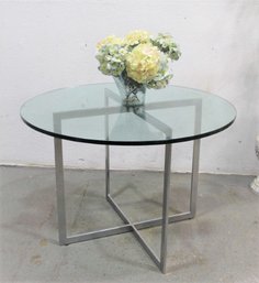 Bauhaus-inspired Chrome X-Base Round Glass Top Dining Table