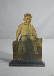 Antique Photograph Of A Boy Sitting