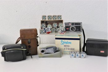 Group Lot Of Vintage Cameras, Flash Cubes, Honeywell Tilt-a-mite Flash Unit, And Spiratone Mini-Strobe