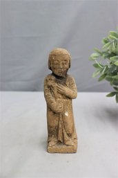 Cast Plaster Figure Of Meditating Buddhist Monk Holding Poppies