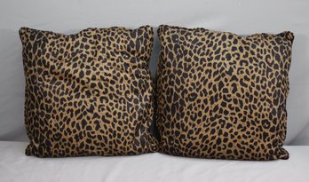 A Pair Of Black/Gold Leopard Print Throw Pillows