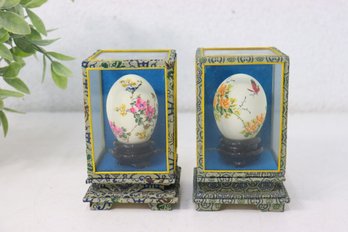 Pair Of Vintage Hand Painted Eggs Showcased In Glass And Silk Display