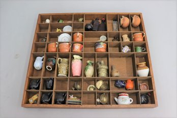 Collection Of Miniatures In A Printers Tray Wall Display