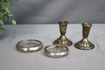 2 Vintage Weighted Sterling Candlesticks & 2 Vintage Rogers Bros. Silver And Glass Coasters