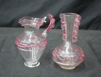 Pair Of Vintage Pink Depression Glass Pitchers With Ornate Designs