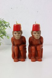 A Pair Of 1996 Accoutrements Monkey Wearing Fez Candles