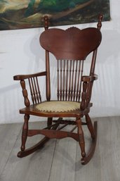 Antique Wooden Rocking Chair With Carved Backrest