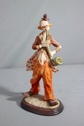 Vintage Pucci Sad Clown Hobo Playing Saxophone Figurine