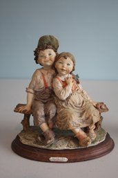 Giuseppe Armani Young Boy And Girl Sitting On Bench Capodimonte Statue