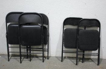 Group Of Black Folding Chairs