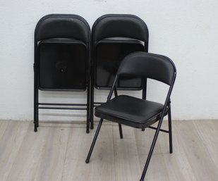 Four (4) Folding Chairs - Vinyl Padded