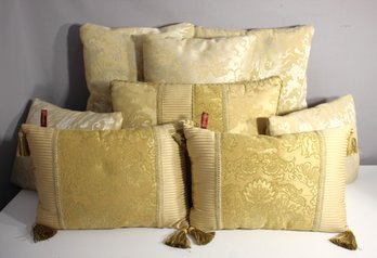 Collection Of Decorative Gold Throw Pillows With Tassel Accents'